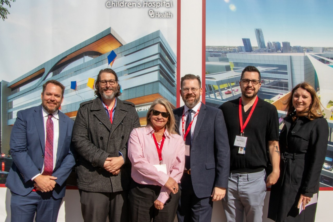 Members of the OMES Grants Management Team pose with University Hospitals Authority Trust officials.