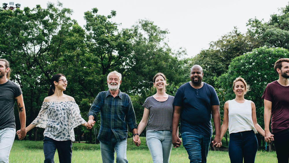 Happy diverse people enjoying in the park