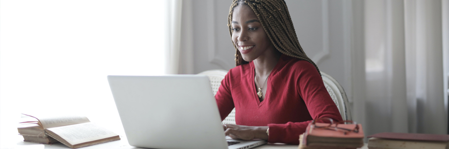 Woman typing on computer