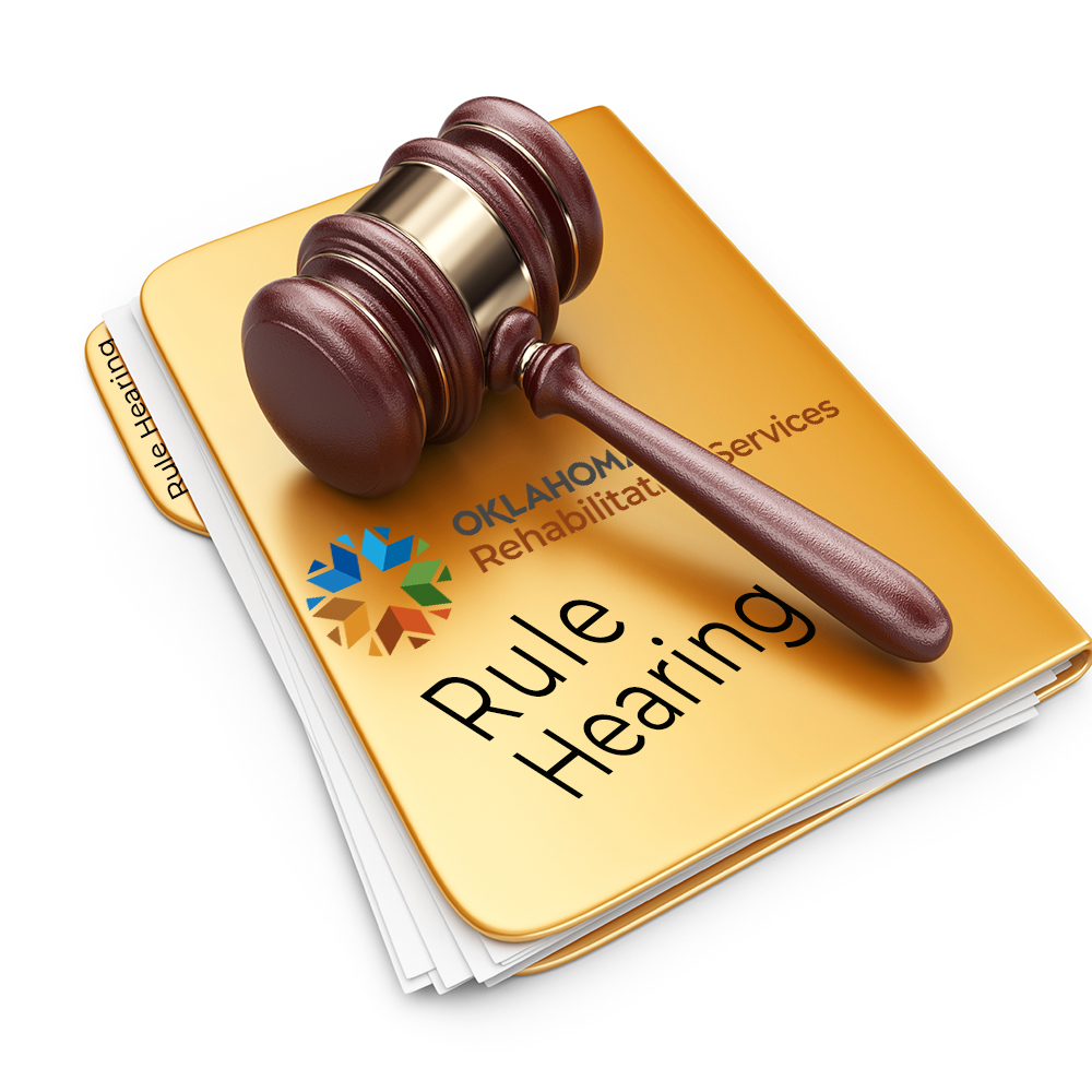 a file folder with DRS logo and  Rule Hearing on it. A gavel sits on top of the folder. 