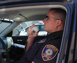 Nomand Policeman talking on the radio