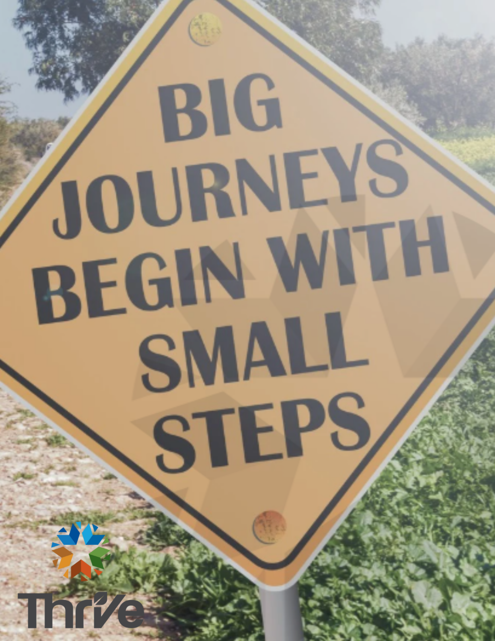 Yellow sign with text big journeys begin with small steps